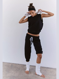 Black Flutter Tank with ruffle sleeves and scoop neck