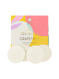 Musee Sea Salt and Grapefruit Shower Steamers box with four round off-white steamers